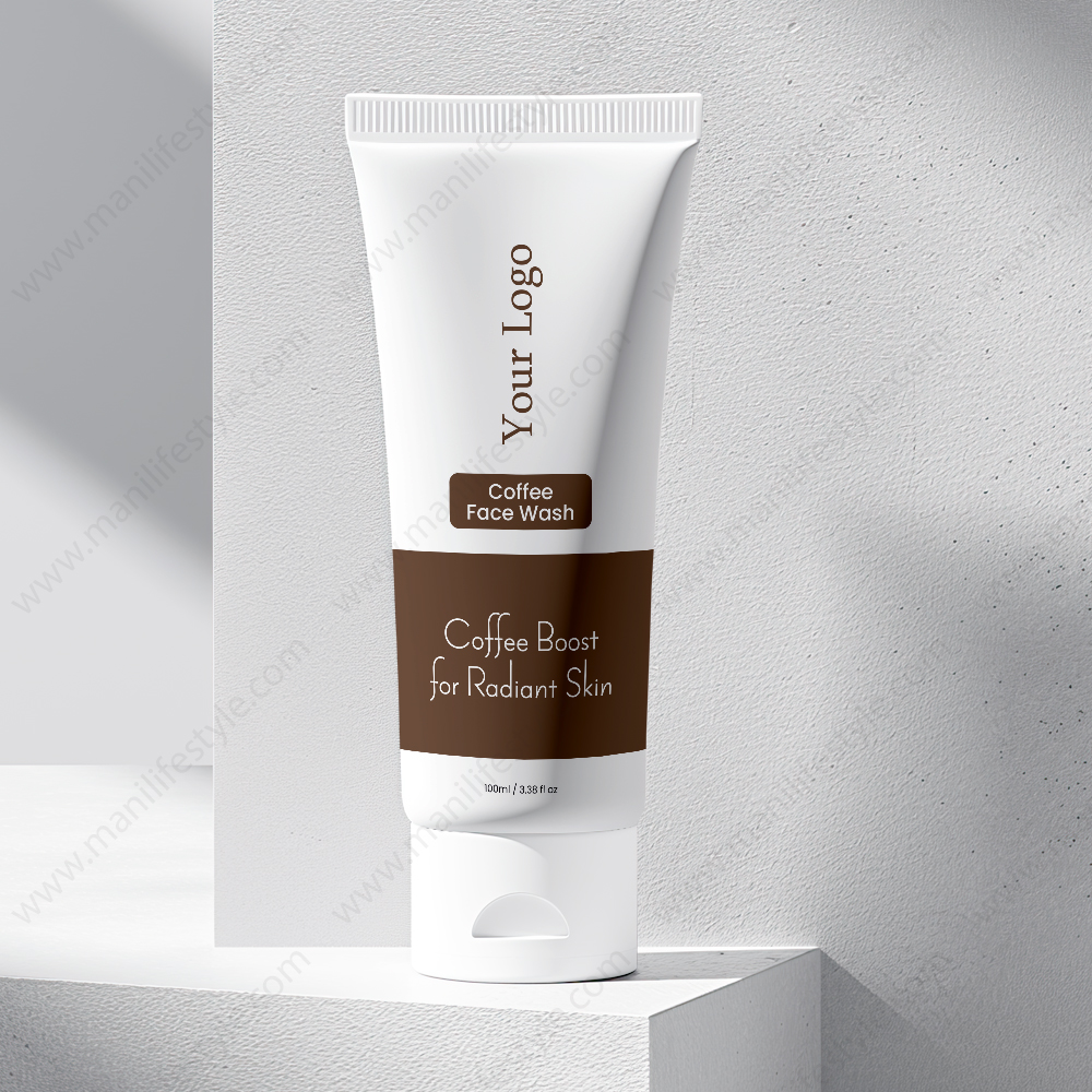 Coffee face wash product tube surrounded by coffee beans